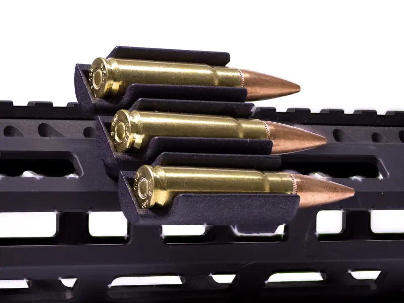 M-LOK round holder displaying compatibility with .223, 5.56, 300 Blackout, and 350 Legend cartridges