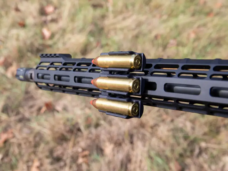 Side view of Ammo Carrier installed on a hunting rifle