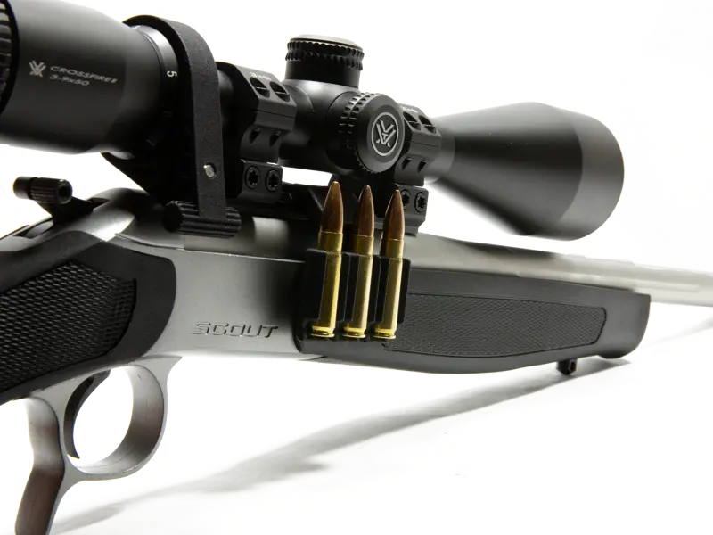Break-action rifle demonstrating full operation with Picatinny ammo carrier installed