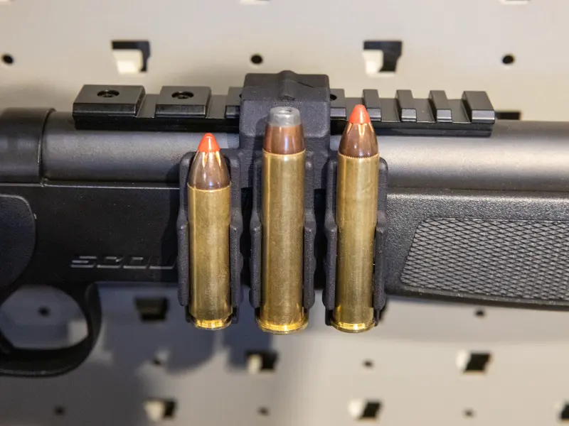 Detailed view of reinforced Picatinny mounting system designed for large caliber recoil