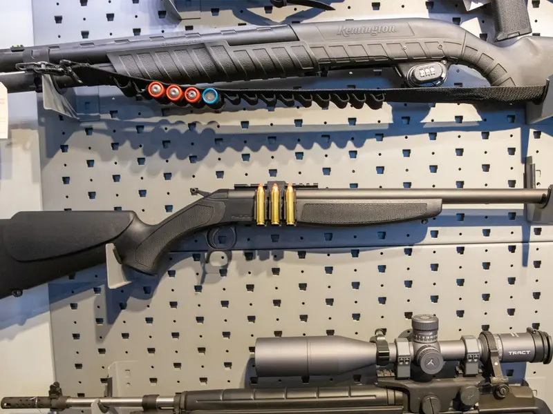 Ammo Carrier for CVA Scout Picatinny rail holding three .450 Bushmaster rounds on a rifle