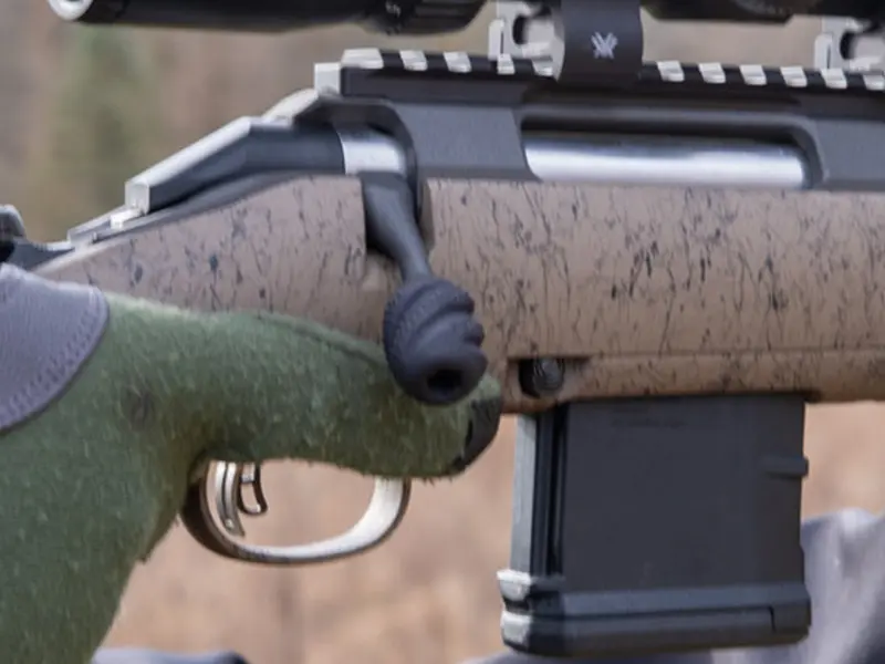Profile comparison showing minimal size increase over factory bolt handle