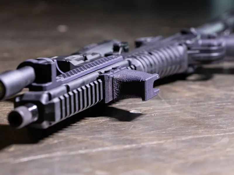 Underside view showing Picatinny mounting interface