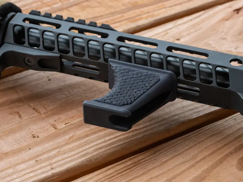 Lightweight profile of the Hand Stop on a modern sporting rifle
