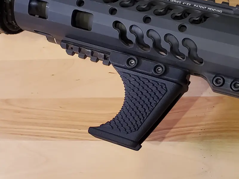 Underside view showing Picatinny mounting interface