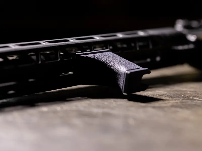 Hand Stop in use, shooter pulling rifle into shoulder