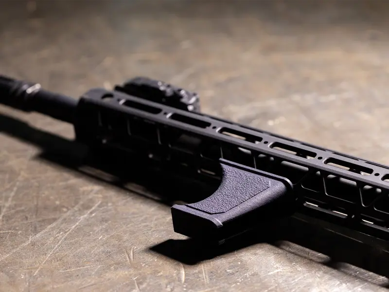 Lightweight profile of the Hand Stop on a modern sporting rifle