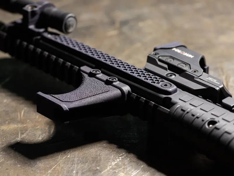 Lightweight profile of the Hand Stop on a modern sporting rifle
