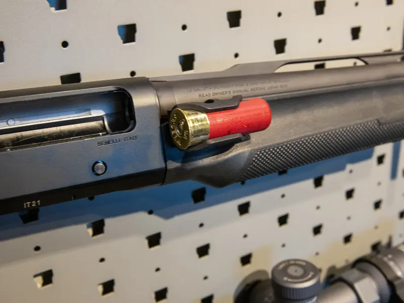 12 gauge shell holder with a round inserted, ready for use