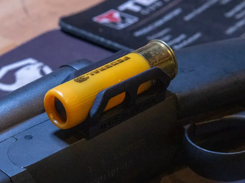 Close-up of 3M VHB tape on the shell holder, showing secure mounting