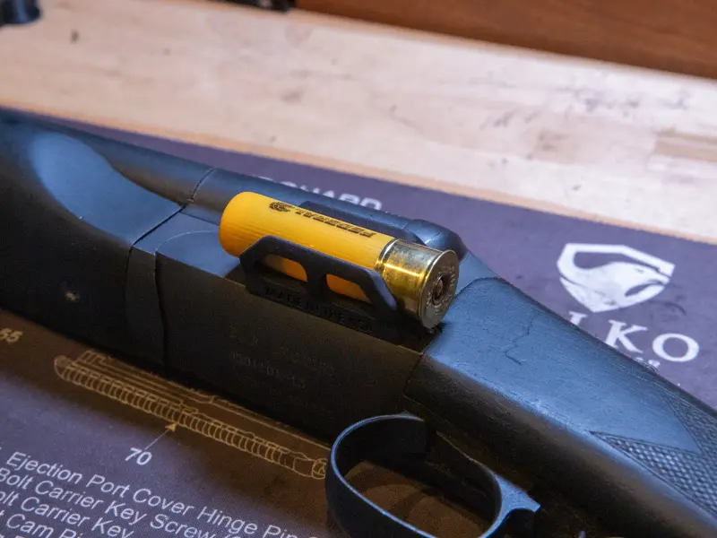 Universal fit for most shotguns, shown on a tactical model