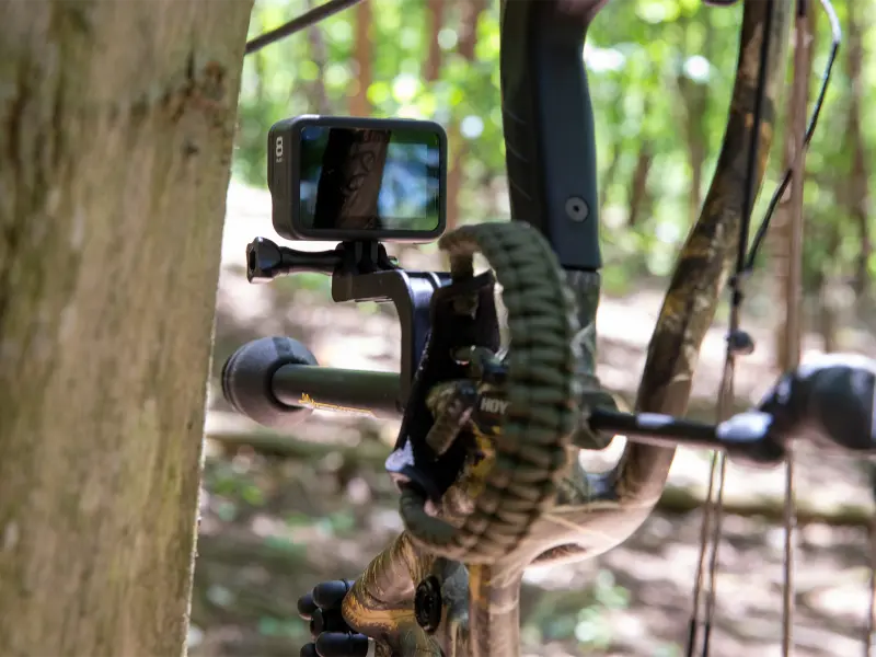 Close-up of camera mount showing alignment with bow sight